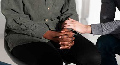 female-hands-consoling-friend